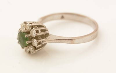 Lot 448 - A tourmaline and diamond cluster ring