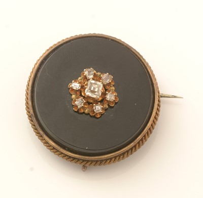 Lot 452 - A Continental 19th Century onyx and diamond brooch