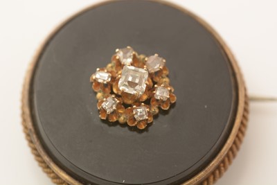 Lot 155 - A Continental 19th Century onyx and diamond brooch