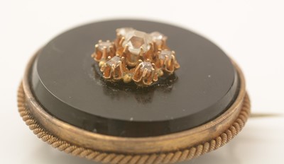 Lot 452 - A Continental 19th Century onyx and diamond brooch