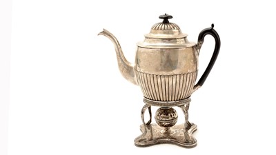 Lot 115 - An early 19th century German silver coffee pot on stand with burner