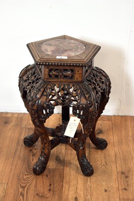 Lot 8 - A 20th Century Chinese Oriental carved hardwood jardiniere stand