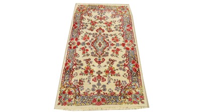 Lot 1177 - A Kirman rug