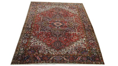 Lot 1186 - A Heriz carpet