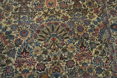 Lot 69 - A Kirman carpet