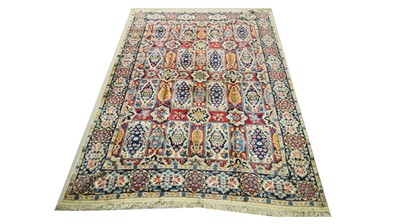 Lot 715 - An early 20th Century Kirman carpet