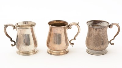 Lot 44 - Three small silver mugs