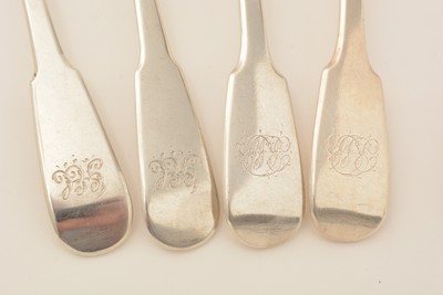 Lot 144 - A set of 11 George IV Scottish silver dessert spoons; and two Newcastle made dessert spoons