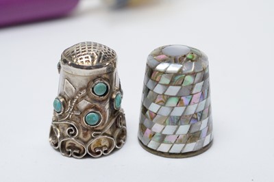 Lot 253 - A collection of silver, silver plated and white metal thimbles