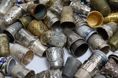 Lot 253 - A collection of silver, silver plated and white metal thimbles