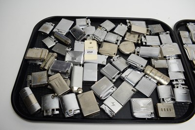 Lot 258 - A collection of silver plated cigarette lighters, of various designs and makers