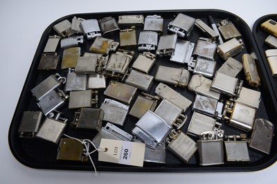 Lot 260 - A collection of silver plated and brass cigarette lighters