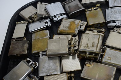 Lot 260 - A collection of silver plated and brass cigarette lighters