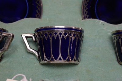 Lot 344 - A cased silver mounted coffee service