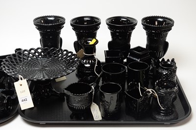 Lot 442 - A collection of black pressed glassware.