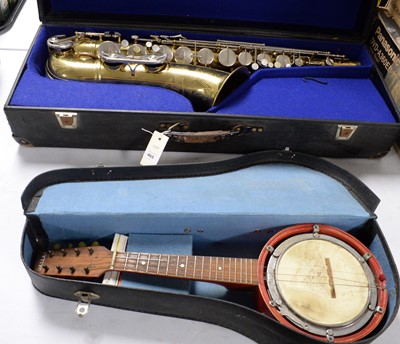 Lot 465 - A Dallas banjo ukelele; and a Berg Larsen saxophone
