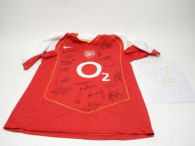 Lot 485 - An autographed Arsenal FC football shirt