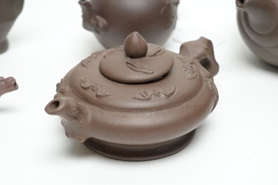 Lot 722 - Eight Chinese Yixing stoneware teapots