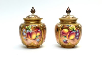 Lot 870 - Pair of Royal Worcester fruit painted vases and covers by Roberts