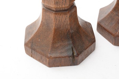 Lot 1292 - Robert Mouseman Thompson of Kilburn, a pair of carved oak candlesticks