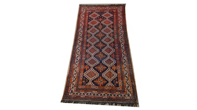 Lot 77 - An early 20th Century Luri carpet