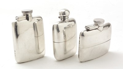 Lot 87 - A George V small silver spirit flask; and two others