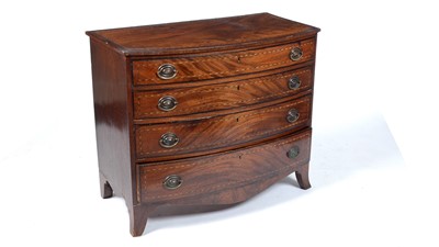 Lot 1314 - A George III mahogany and banded bowfront chest