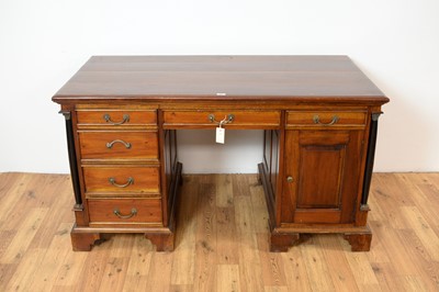 Lot 35 - A 20th Century hardwood writing desk