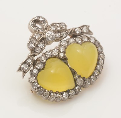 Lot 704 - A Victorian yellow chalcedony and diamond brooch