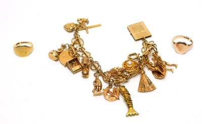 Lot 1103 - A 9ct yellow gold charm bracelet, and two rings