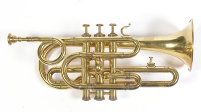 Lot 728 - A brass cornet by Joseph Wallace London.