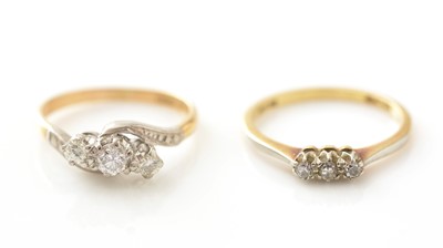 Lot 714 - Two three-stone diamond rings
