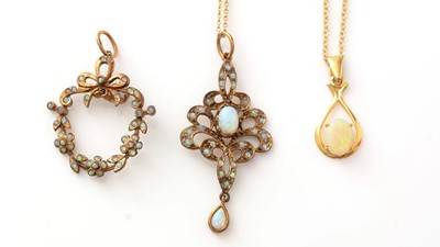 Lot 715 - Three opal pendants