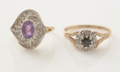 Lot 740 - An amethyst and diamond cluster ring; and a sapphire and diamond cluster ring