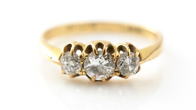 Lot 764 - A three stone diamond ring