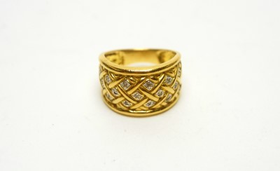 Lot 1099 - An 18ct yellow gold and diamond ring