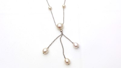 Lot 502 - A cultured pearl and diamond drop necklace