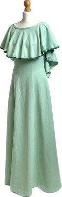 Lot 1173 - Two 1970s evening maxi dresses in pastel tones