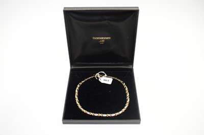 Lot 963 - A 9ct yellow and white gold necklace