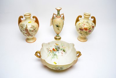 Lot 116 - A Royal Worcester blush ivory twin handled urn vase