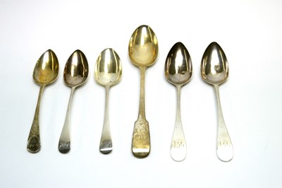 Lot 861 - A selection of silver table spoons, and a gravy spoon