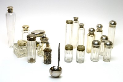 Lot 875 - A selection of glass dressing table, scent and other bottles, and a toddy ladle