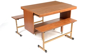 Lot 36 - A mid 20th-Century metamorphic teak and formica drinks trolley/dining table