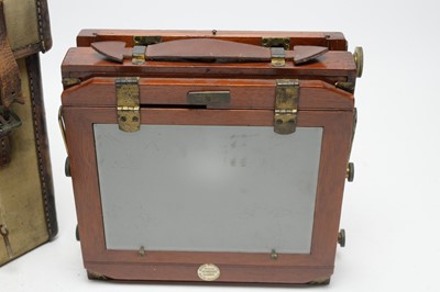 Lot 439 - A quarter plate camera with slides retailed by George Mason of Glasgow