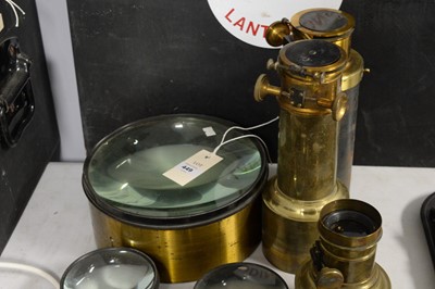 Lot 449 - A collection of seven Magic Lantern condenser lenses and more