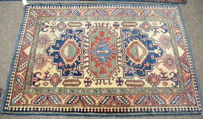 Lot 94 - A Turkish rug and another.