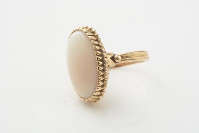 Lot 171 - A light blue paste ring and a Coral ring