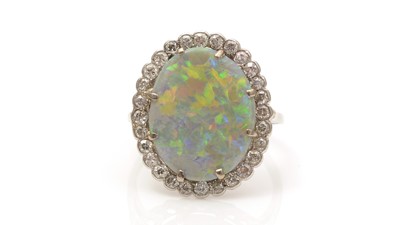 Lot 708 - An opal and diamond cluster ring