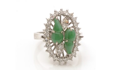 Lot 710 - A jade and diamond ring