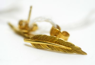 Lot 967 - A pair of 18ct gold feather earrings